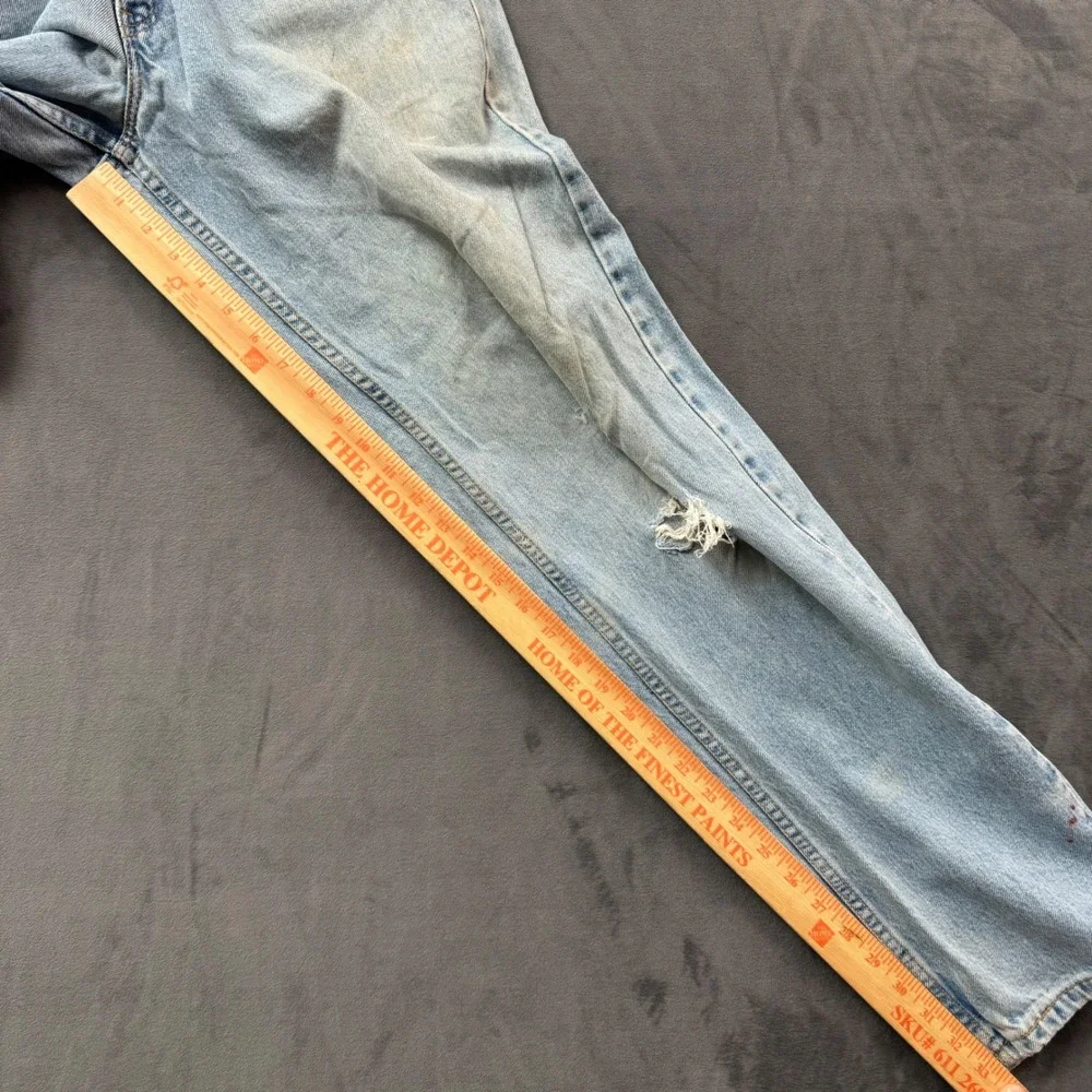 Vintage Levis 550 Relaxed Fit Jeans Light Wash Made in USA 33x34 Distressed